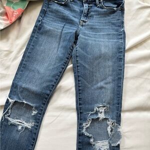 Distressed Blue Jeans